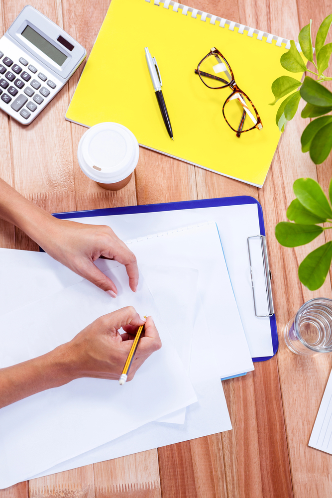 Optometrist accountant with paperwork Optometrist accountant with paperwork