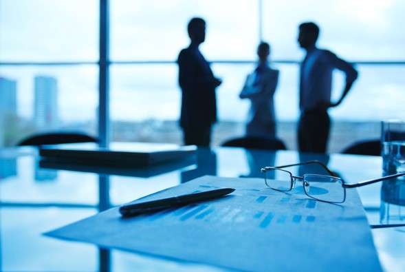 Business people discussing salary vs dividends
